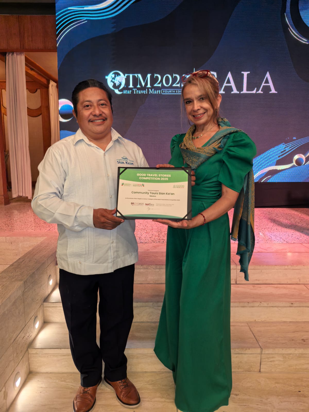 Roman and Beatriz with the Good Travel Stories recognition