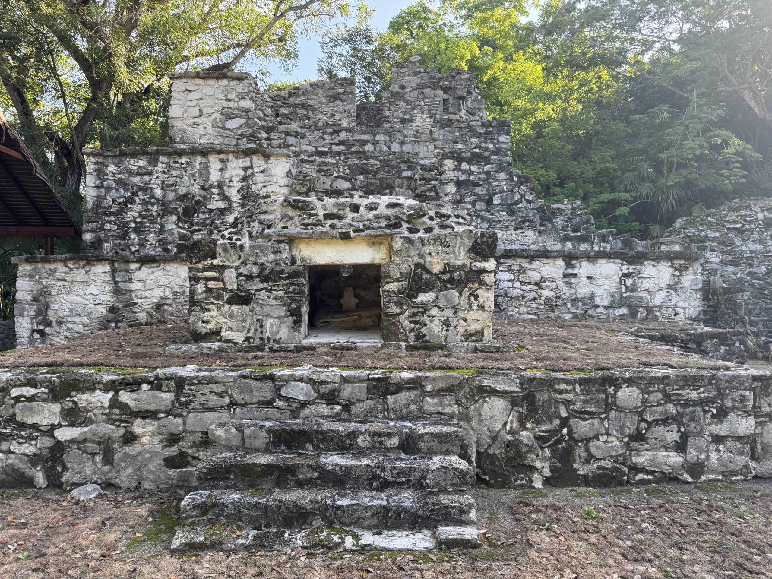 Small offering left inside a temple at the Muyil ruins — living Maya tradition in Sian Ka'an