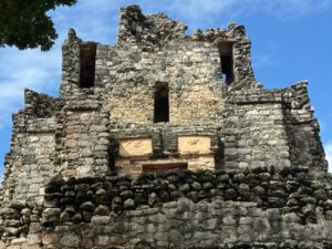 Close-up of the upper temple and stucco details of El Castillo pyramid at Muyil