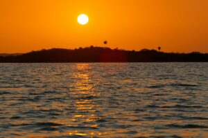 Golden sunset over the lagoon on the Sunset Ancient Canal experience in Sian Ka´an