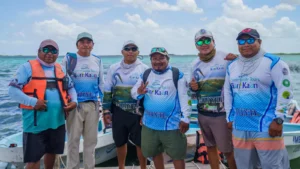 Team of boat captains standing together on the dock