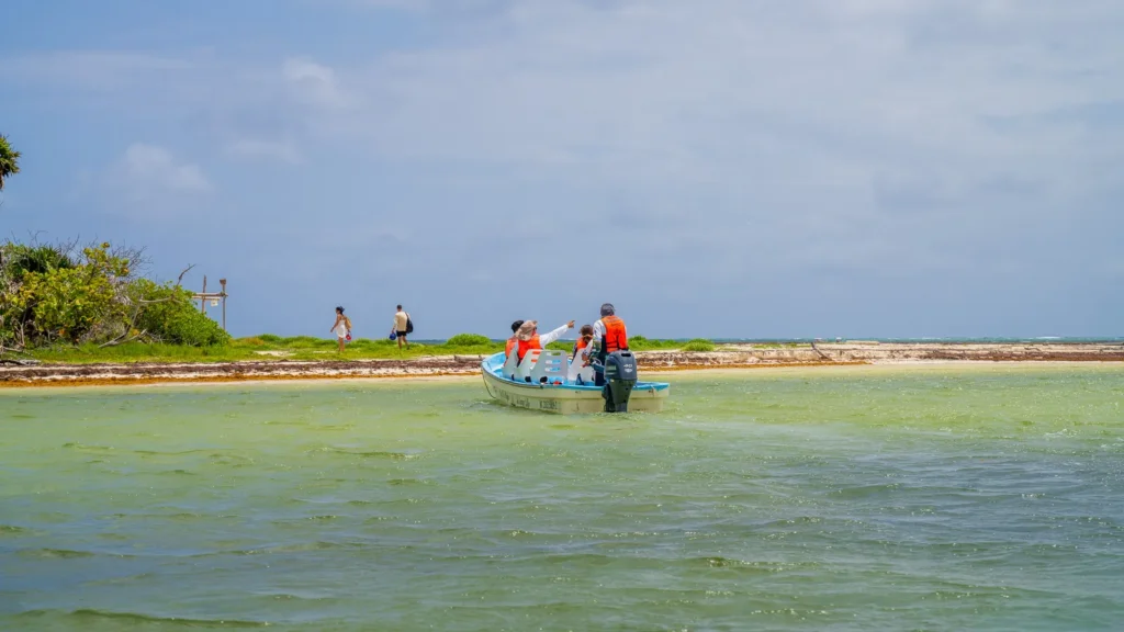 Small boat beached on a shallow sandbar near Boca Paila