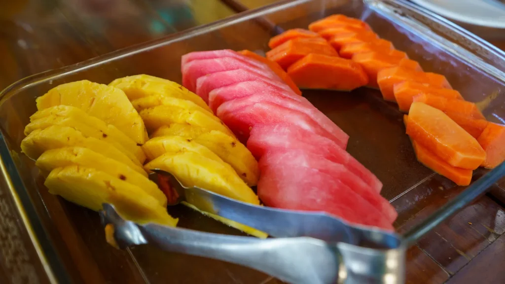 Fresh pineapple, watermelon and papaya served at the cooperative breakfast